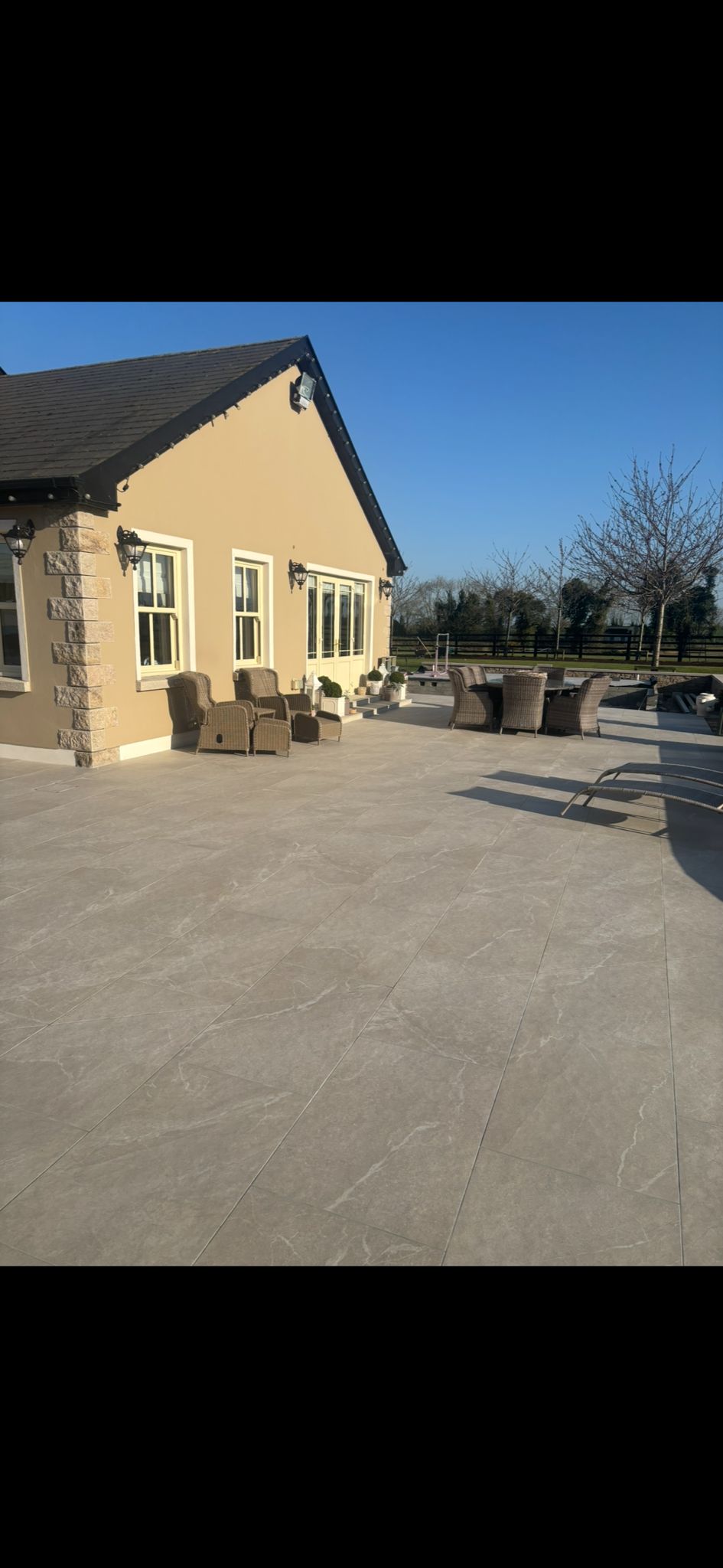 Large format porcelain patio by Kinsella Home Improvements