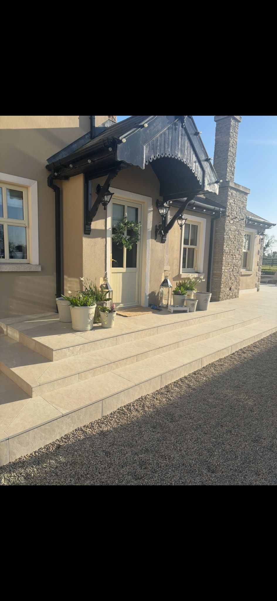 Tiled entrance steps by Kinsella Home Improvements